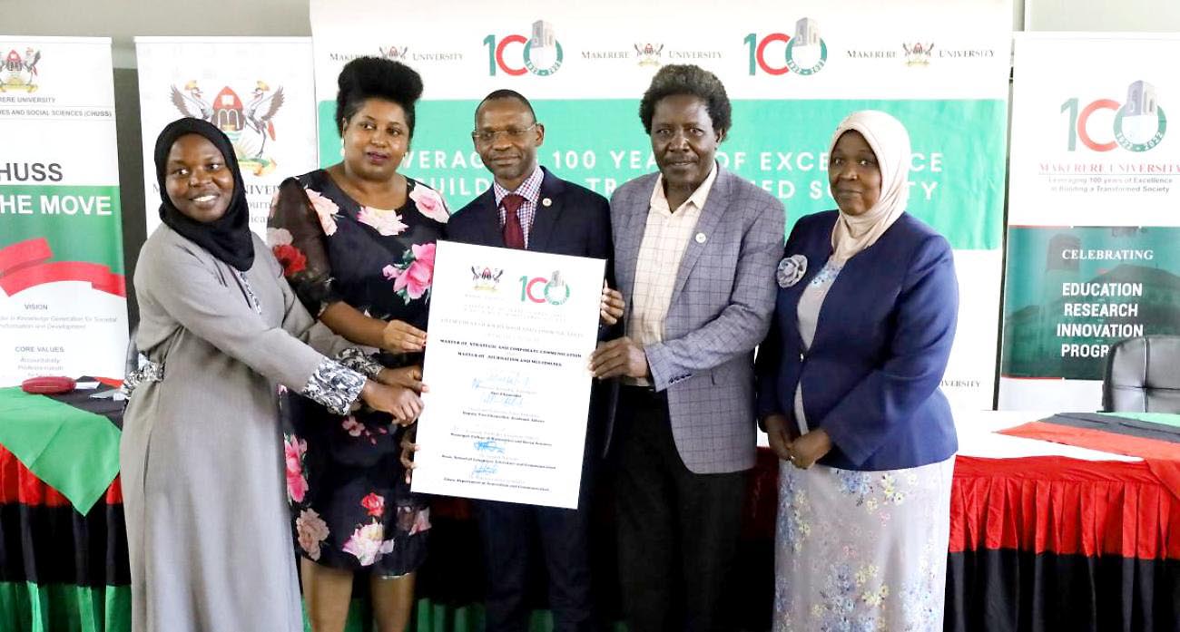 L-R: Dr. Aisha Nakiwala, Ms. Sarah Kagingo, Prof. Umar Kakumba, Prof. Patrick Mangeni and Dr. Saudah Namyalo pose for a group photo after the launch of the Master of Strategic and Corporate Communication and the Master of Journalism and Multimedia on 20th October 2022, Makerere University.