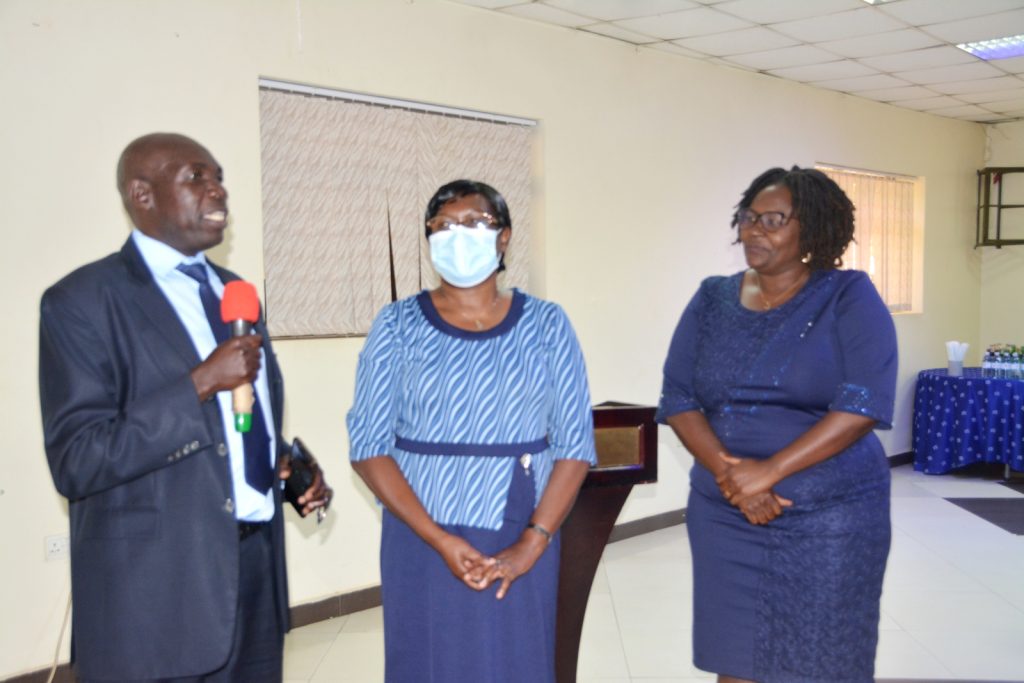 Prof. Okuni Julius Boniface (Left) recognizes fellow researchers.