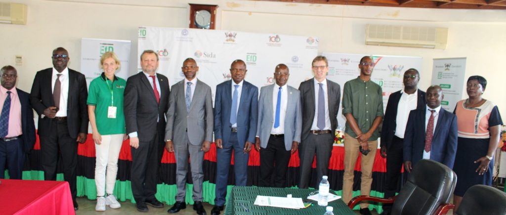 Members of the EfD Global hub and EfD-Mak Advisory Board pose for a group photo after the opening.