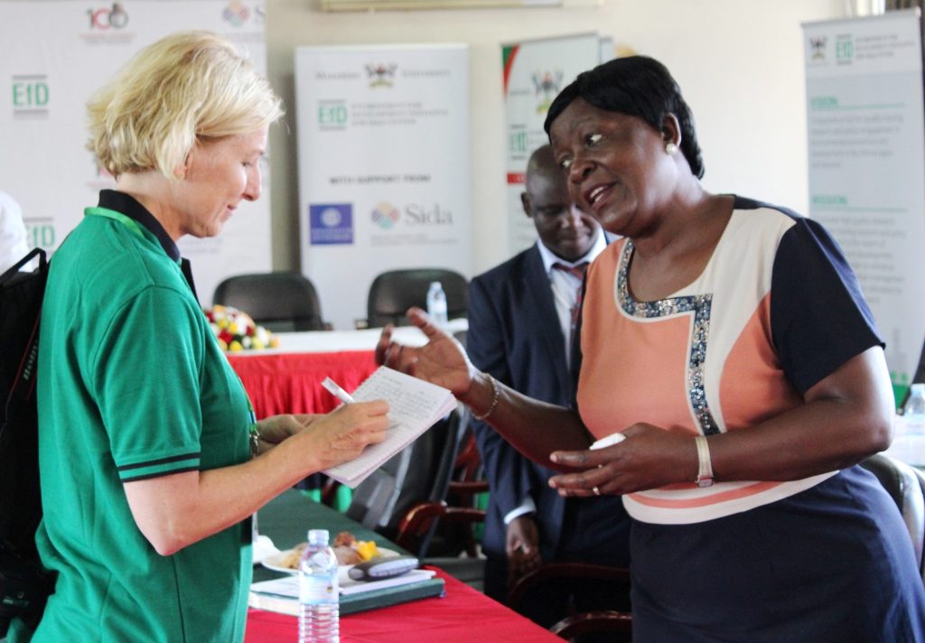 EfD Global hub Communications expert Petra Hansson interacts with Rebecca Sabaganzi after the panel discussions.