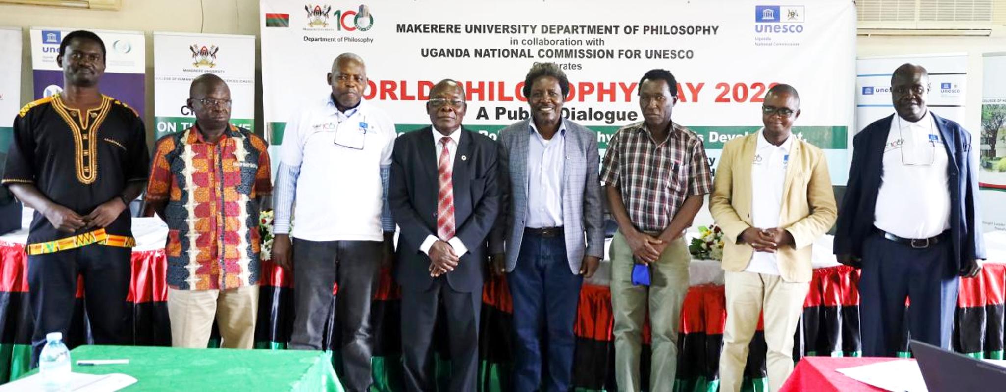 Keynote speaker Prof. Eriabu Lugujjo (4th Left) poses for a group photo with some panelists, UNESCO team and members of management from CHUSS on 17th November 2022.