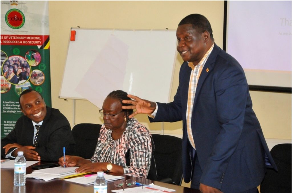 Dr. Baguma (C) flanked by Dr. Kankya (L) and  Dr.David Onen from CEES  made contributions in the discussion.