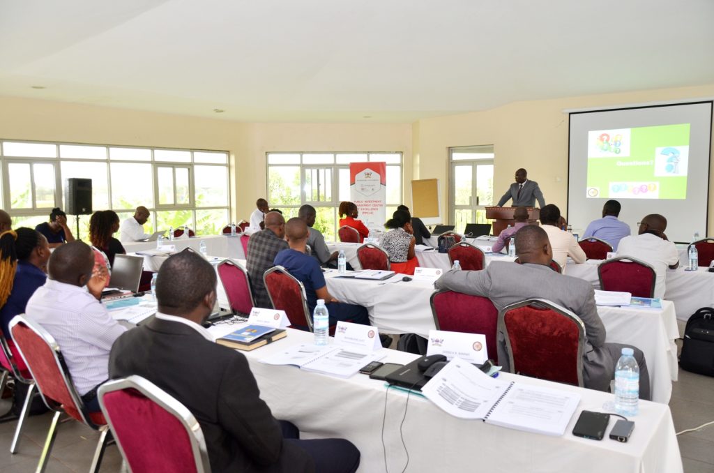 Participants listen to one of the facilitators.