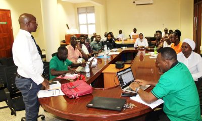 Prof. Edward Bbaale (Left) addresses some of the participants attending the seminar on 1st December 2022 at the EfD-Mak Centre, Makerere University.