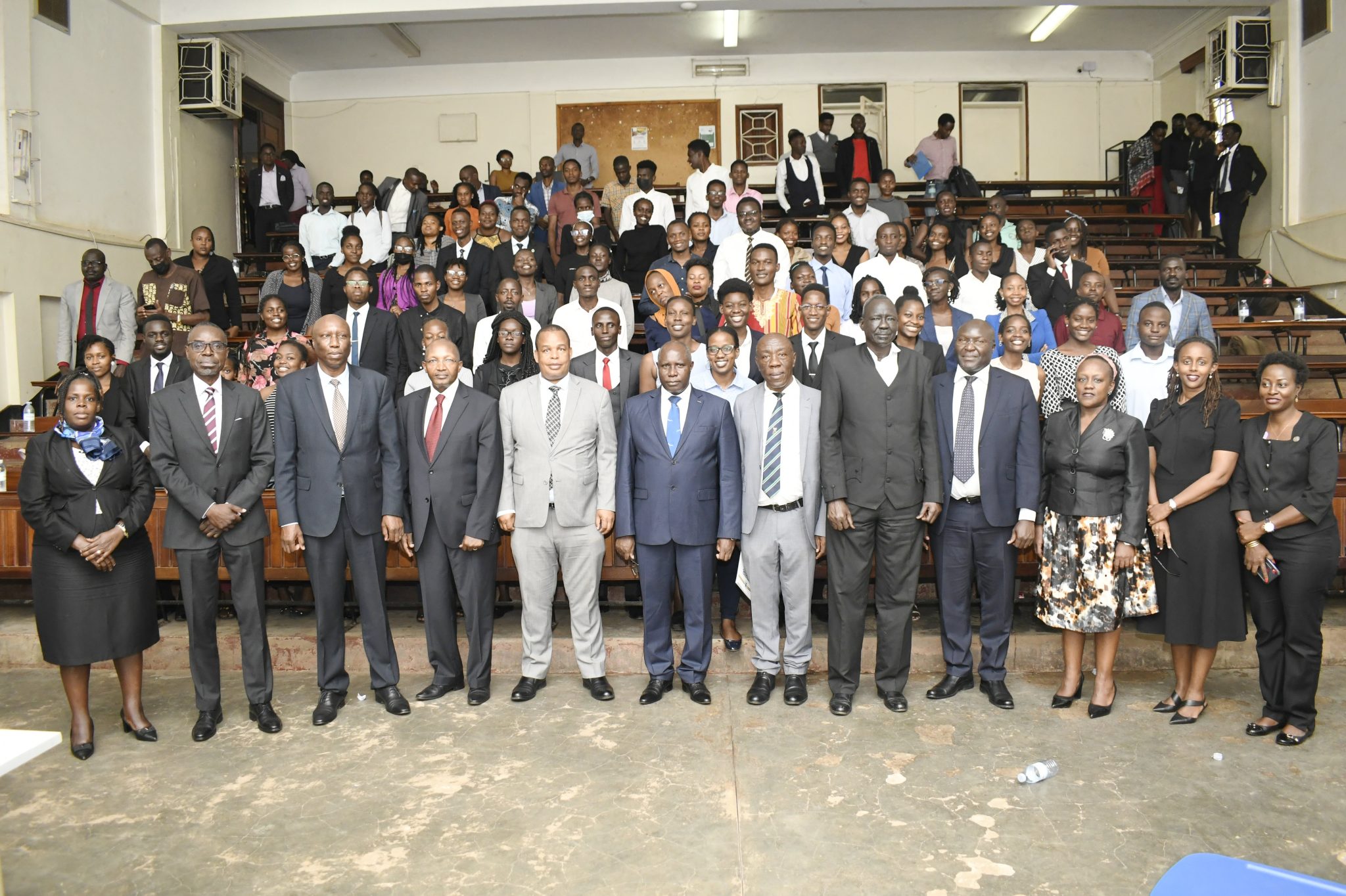The High Level Delegation from East African Court of Justice (EACJ) poses for a group photo with the DVCFA-Prof. Henry Alinaitwe (6th L), Ag. Principal-Assoc. Prof. Ronald Naluwairo (4th L), Staff and Students at the School of Law on 30th November 2022.