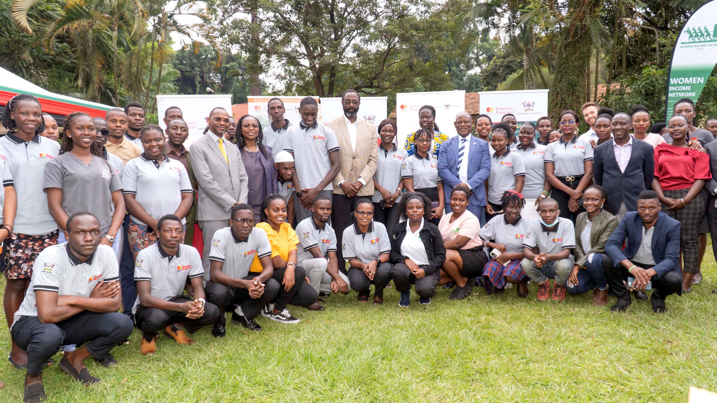 Scholars posing in a group photo with the offcials at the end of the luncheon on 29th November 2022, Makerere University Guest House.