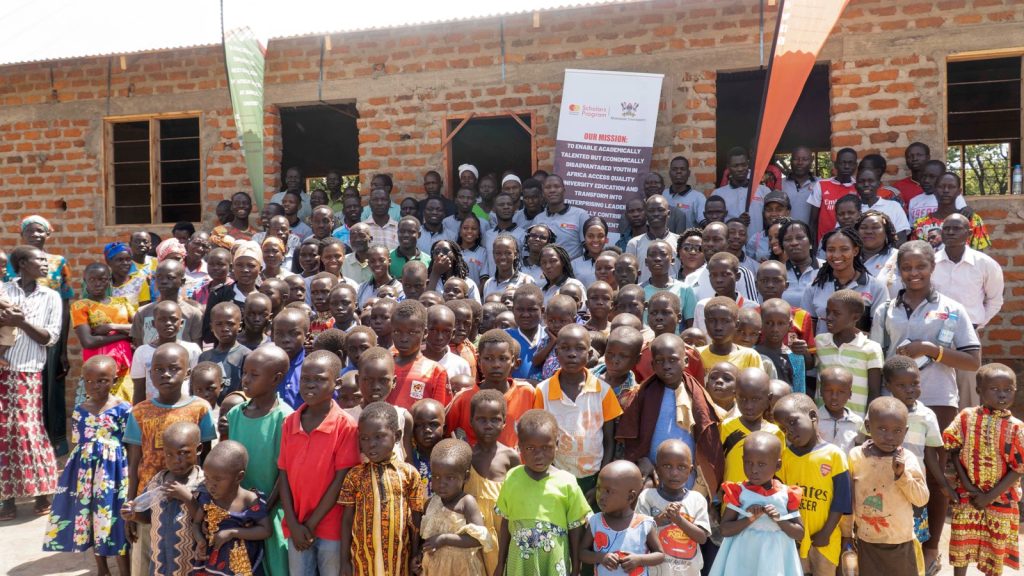 Some of the pupils of St.Catherine Proimary School together with the Scholars and other offcials during the launch.