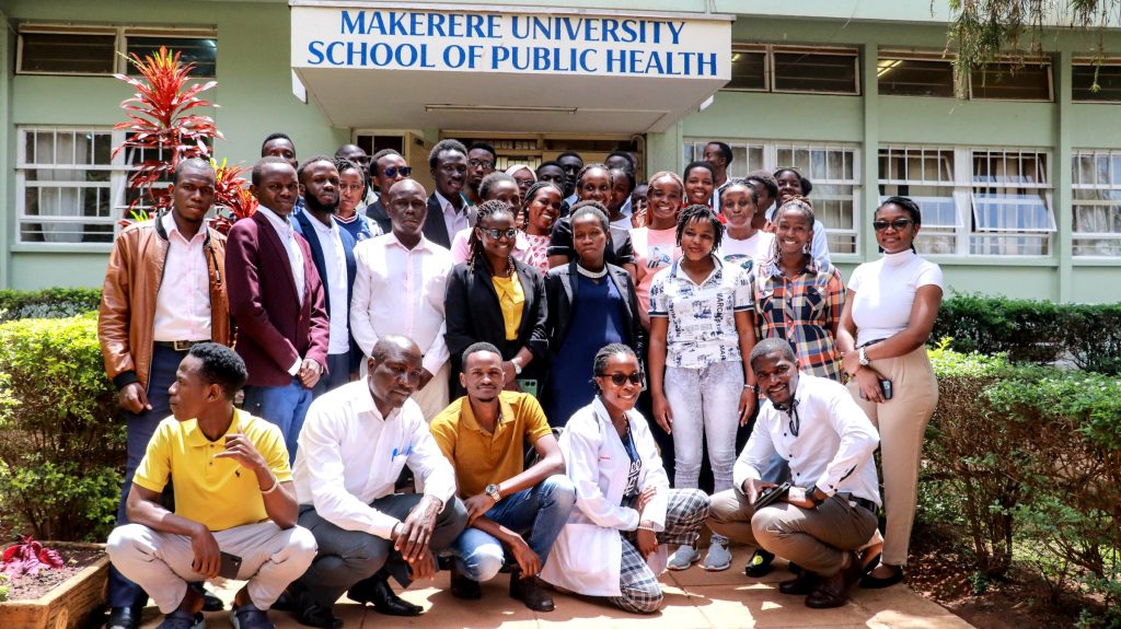 Allan Ssembuusi with classmates in a group photo on Thursday, ‎1 ‎September ‎2022.