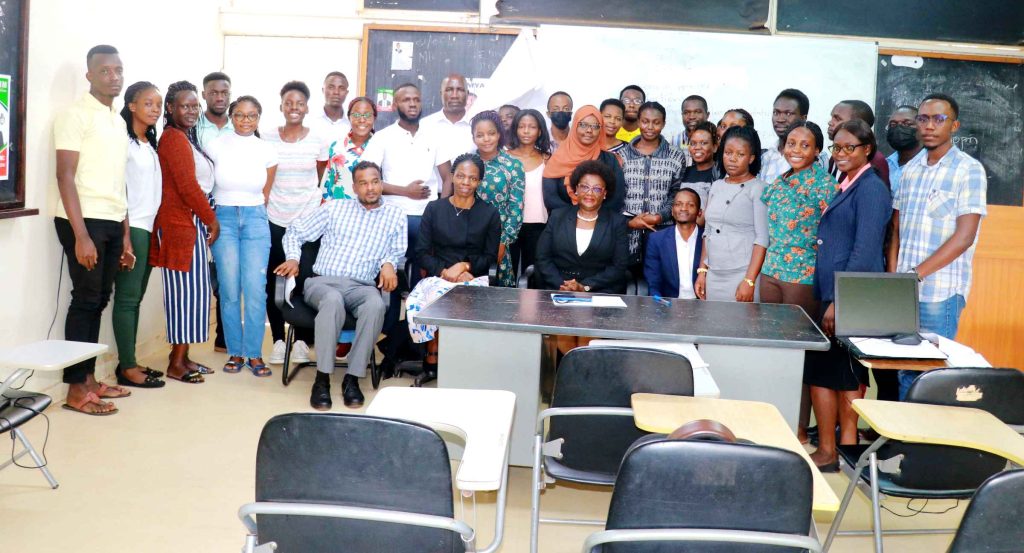 Allan Ssembuusi seated extreme left next to the Dean, Prof. Rhoda Wanyenze, Associate Prof. Esther Buregyeya, the Head, Disease Control and Environmental Health Department, Mr. Ali Halage the Coordinator of the Bachelor of Environmental Health Sciences and the Class.