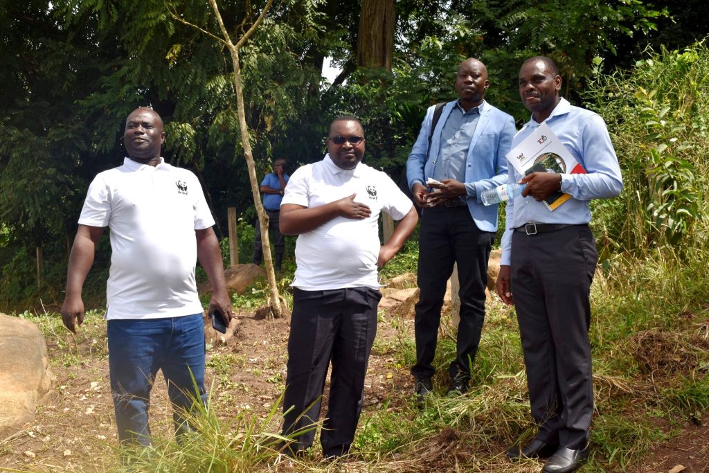 Prof. Fred Babweteera (R), Dean School of Forestry, Environmental and Geographical Sciences, CAES, Makerere University, with partners during the launch of the CAES symbolic botanical gardens.