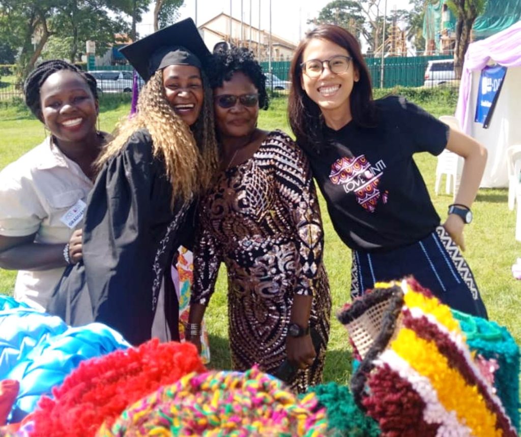 Elle Yang, the Director of Love Binti International (Right) poses with one of the graduands and her family.
