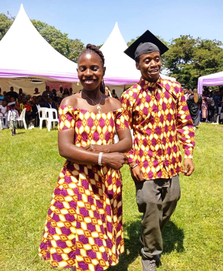 Graduands with matching outfits pose for the camera.