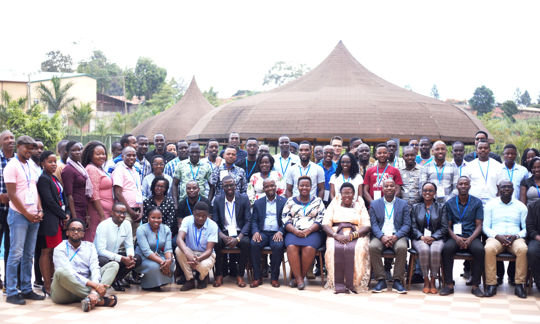 DHIS2 Academy participants take a group photo with the State Minister for Primary Education, Dr. Joyce Kaducu (Front Row in Gomesi) at the workshop.