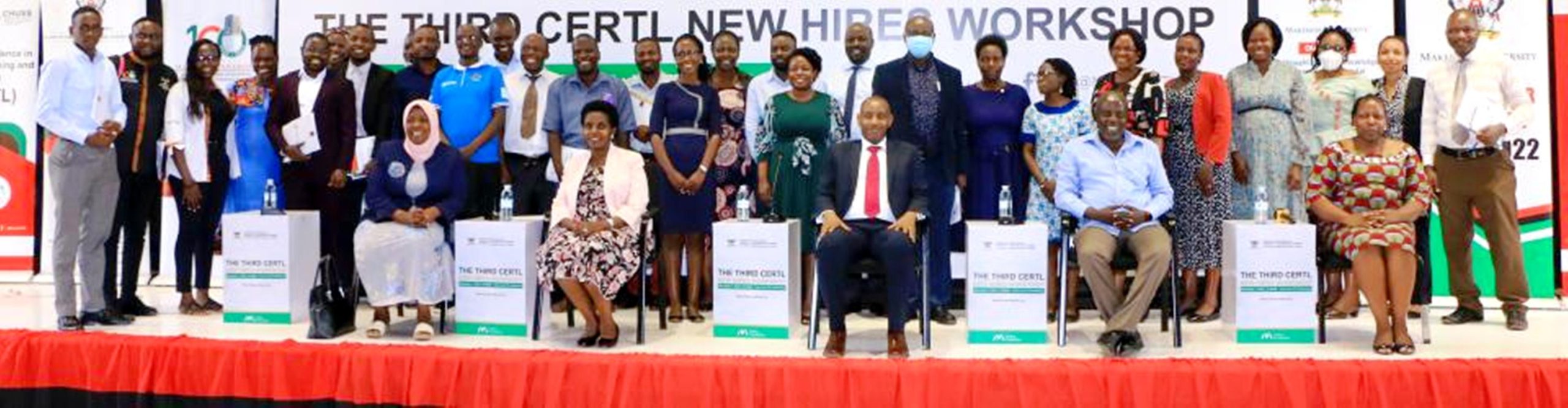 Facilitators pose for a group photo with a section of participants after the CERTL New Hires Workshop held in the Yusuf Lule Auditorium, Makerere University on 7th December 2022.