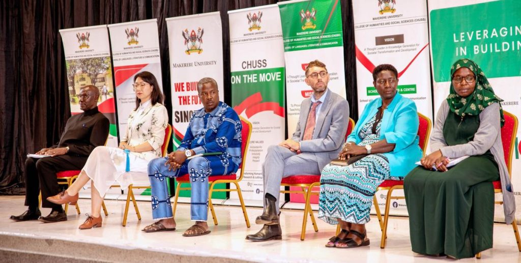 A panel of discussants on language teaching at Makerere on stage.