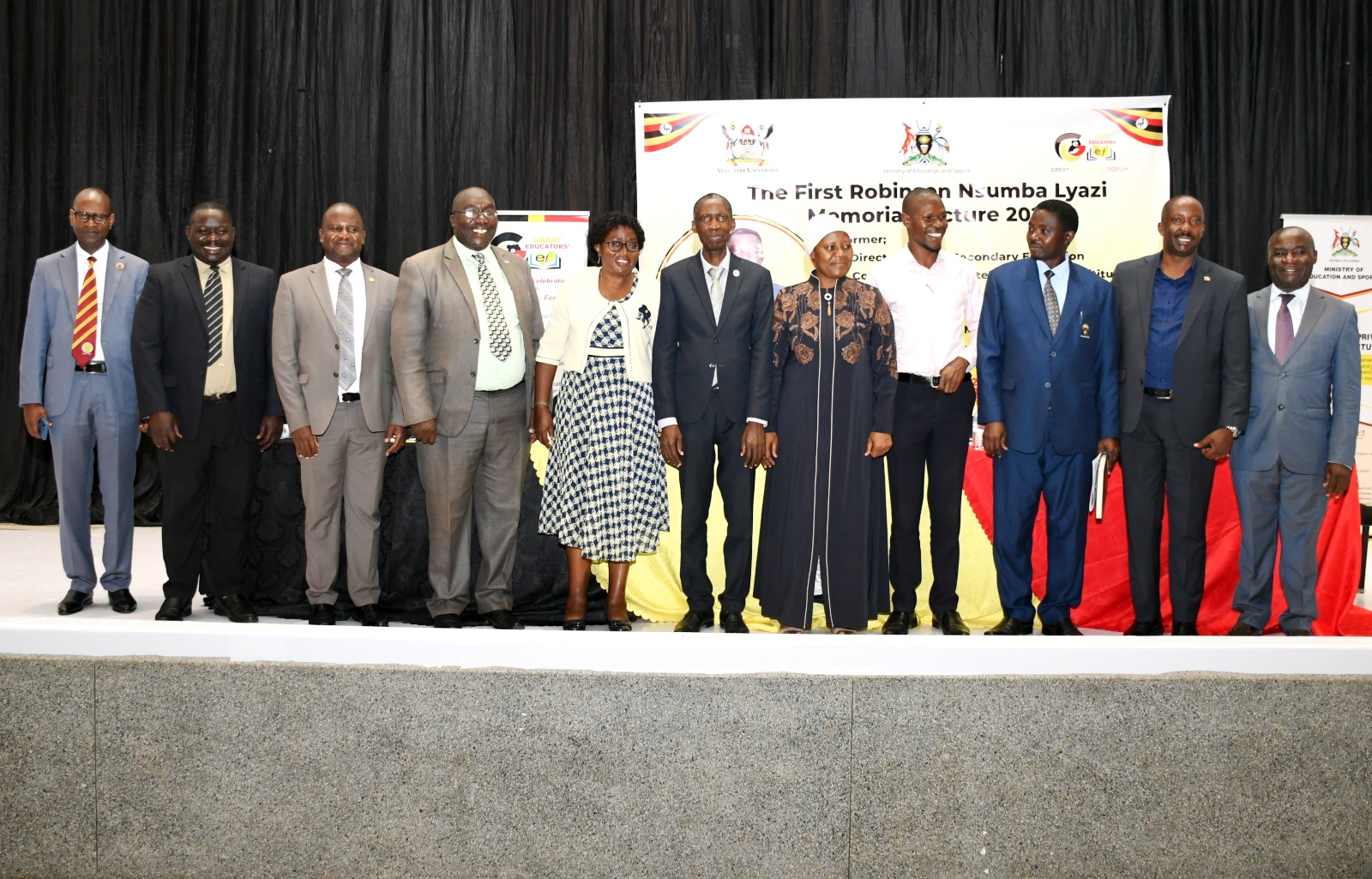 Mr. George Mutekanga (4th L) is joined by the Principal CAES-Prof. Anthony Muwagga Mugagga (C), Hajjat Zaujja Ndifuna (5th R) and other officials for a group photo at the First Robinson Nsumba-Lyazi Memorial Lecture on 25th January 2023, Yusuf Lule Central Teaching Facility Auditorium, Makerere Univeristy.