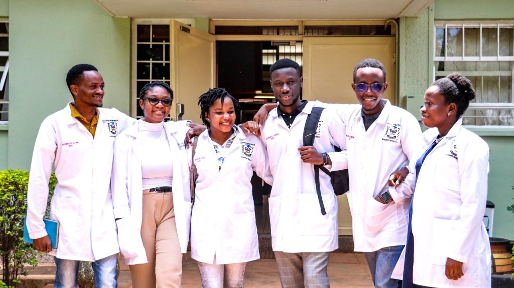 Carol Esther Nabbanja, third left with her classmates during the times at MakSPH.