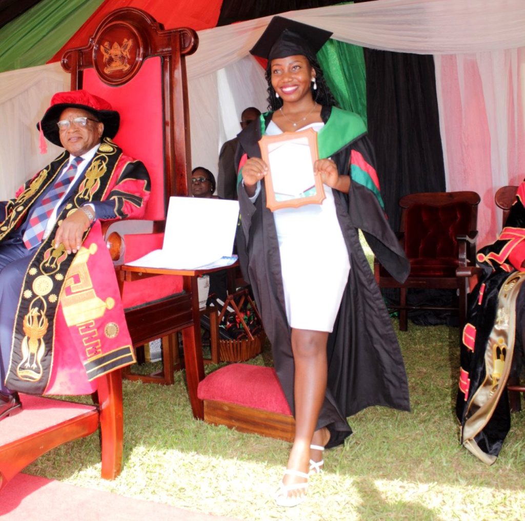 The Chancellor, Prof. Ezra Suruma (Right) with Mastercard sponsored student from CAES Ms. Gertrude Nampeera who attained a CGPA of 4.44 in the Bachelor of Agribusiness Management.