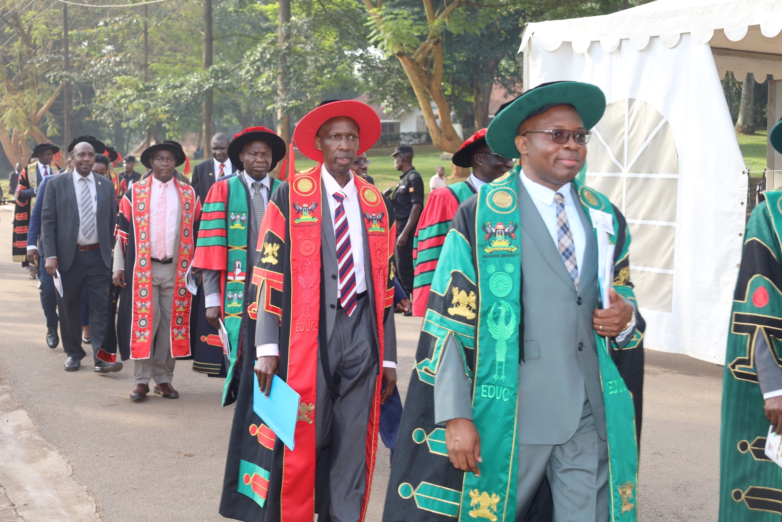 The Principal CEES, Prof. Anthony Muwagga Mugagga (2nd R) and Deputy Principal CEES, Prof. Ronald Bisaso in the Procession to the Freedom Square on Day 2 of the 73rd Graduation Ceremony on 14th February 2023, Makerere University.