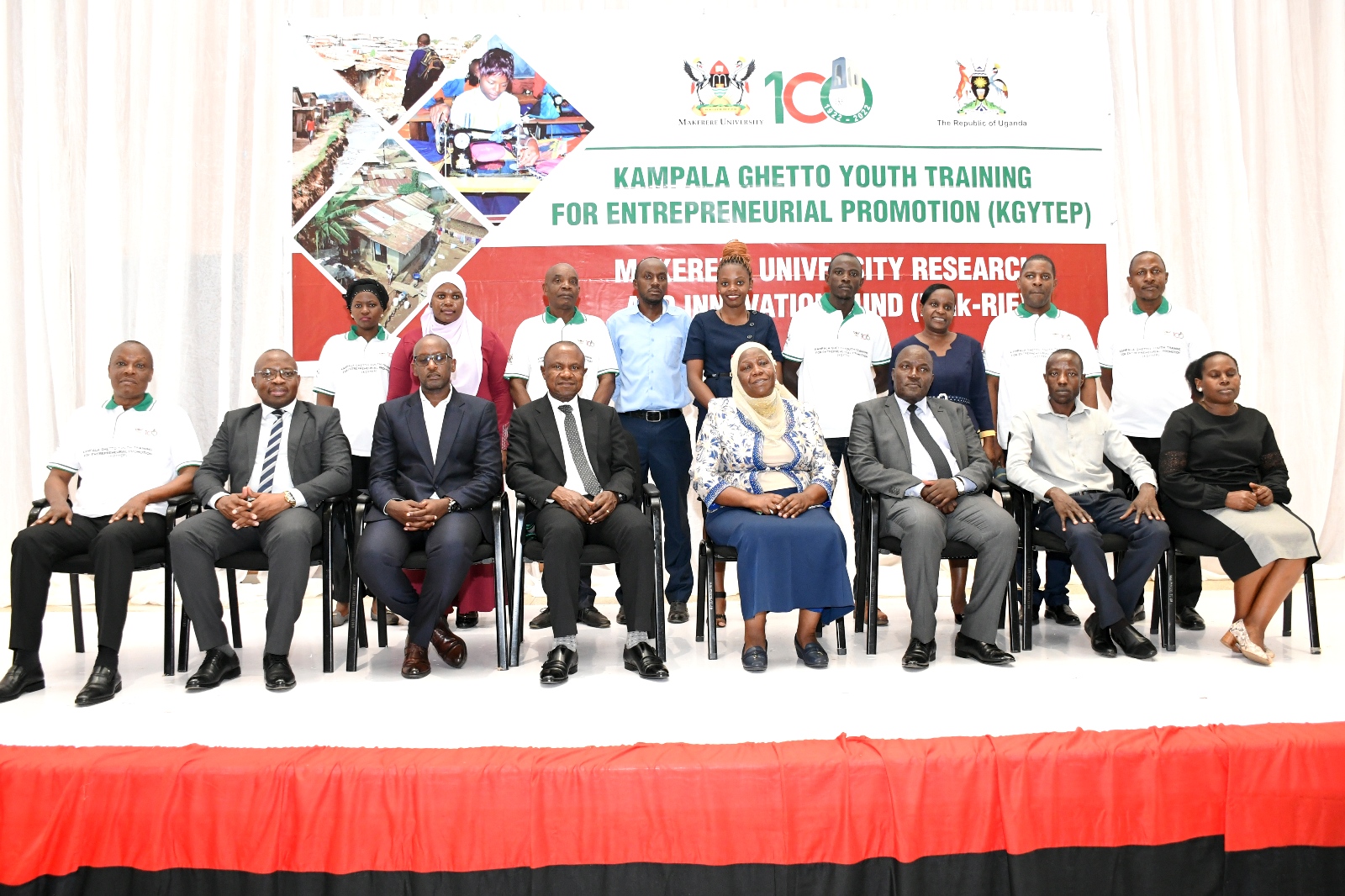 Hon. Hajjat Minsa Kabanda (4th R), Prof. Eria Hisali (4th L), Prof. Masagazi Masaazi (3rd R), Prof. Ronald Bisaso (2nd L) and Dr. Badru Musisi (L) pose for a group photo with other officials at the KGYTEP launch held on 31st January 2023 in the Yusuf Lule Auditorium, Makerere University.