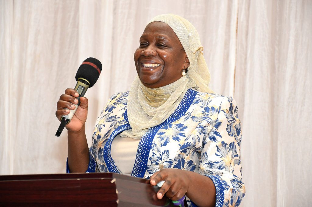 Hon. Hajjat Minsa Kabanda smiles as she addresses the audience a the launch. 