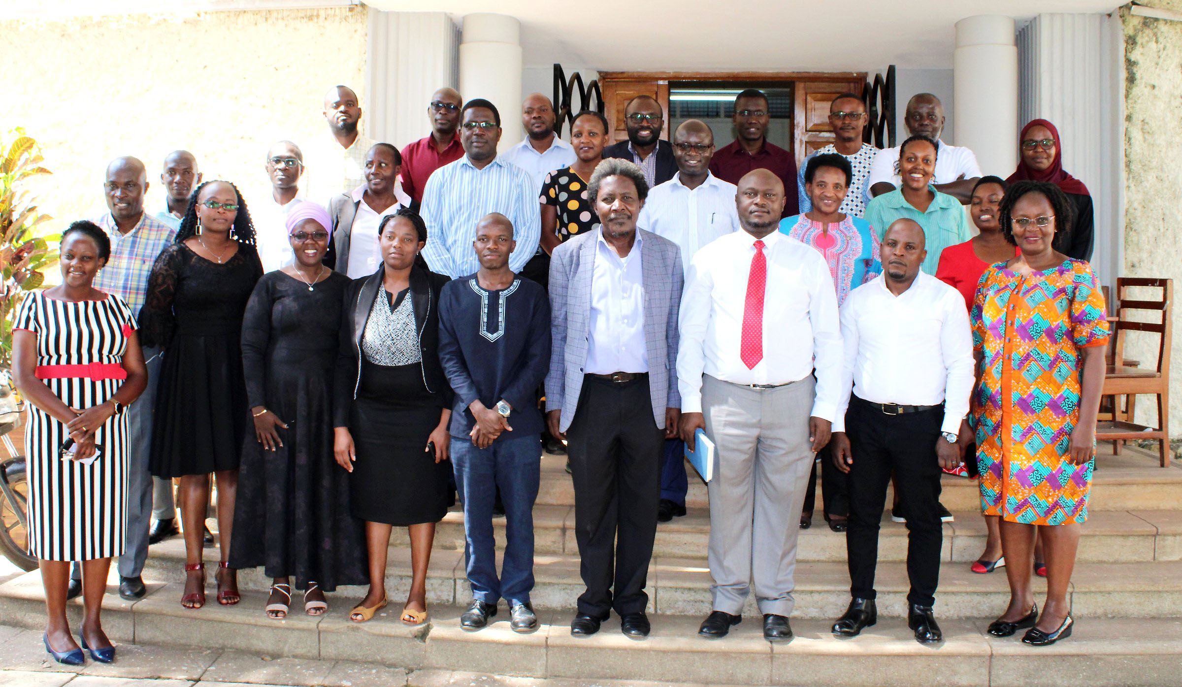 The Deputy Principal CHUSS-Dr. Eric Awich Ochen (3rd R) and Dean, School of Liberal and Performing Arts Associate Prof. Patrick Mangeni (4th R) with college officials and the Gerda Henkel Siftung Cohort 2022 PhD Fellows after their orientation on 30th January 2023 at Makerere University, Kampala Uganda..