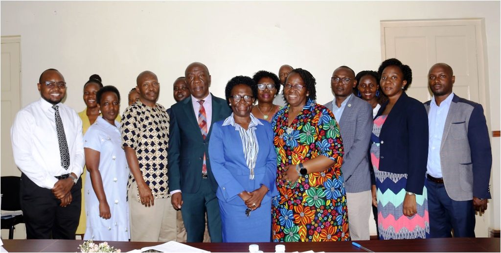Professor Henry Alinaitwe (Front 4th Left), Professor Sylvia Nannyonga-Tamusuza the current Head GAMSU (Center blue coat), Professor Grace Bantebya Kyomuhenndo former Head GAMSU (Front 4th Right) and other staff posing for a group photo during the handover ceremony.
