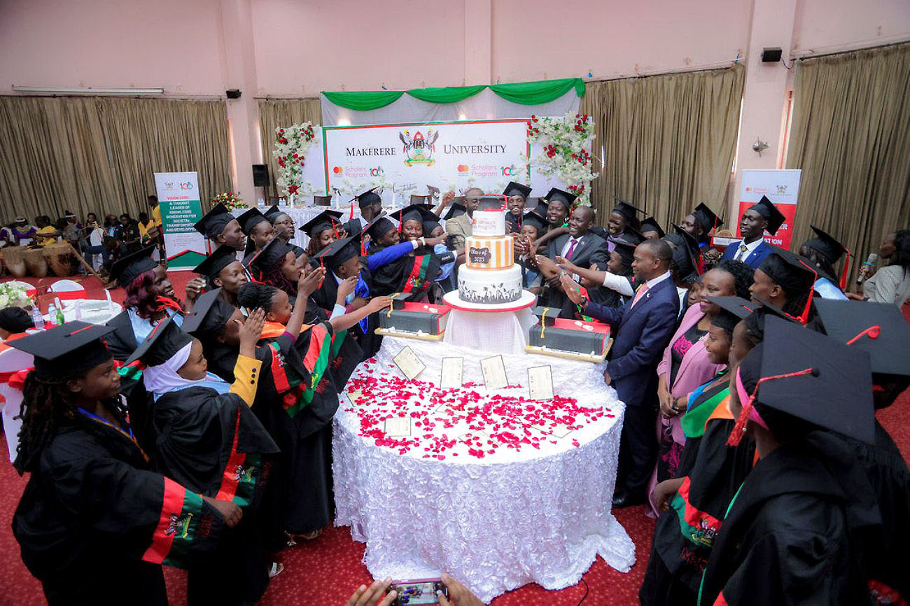 Rt. Hon. Daniel Fred Kidega, Prof. Umar Kakumba, Dr. Florence Nakayiwa and other officials are joined by some of the 292 MCFSP Graduates of the 73rd Graduation Ceremony of Makerere University to cut the celebration cake on 17th February 2023.
