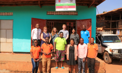 The NTU-Mak delegation posing with some of the community health workers at the field office in Nakawuka, Wakiso district.