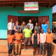 The NTU-Mak delegation posing with some of the community health workers at the field office in Nakawuka, Wakiso district.