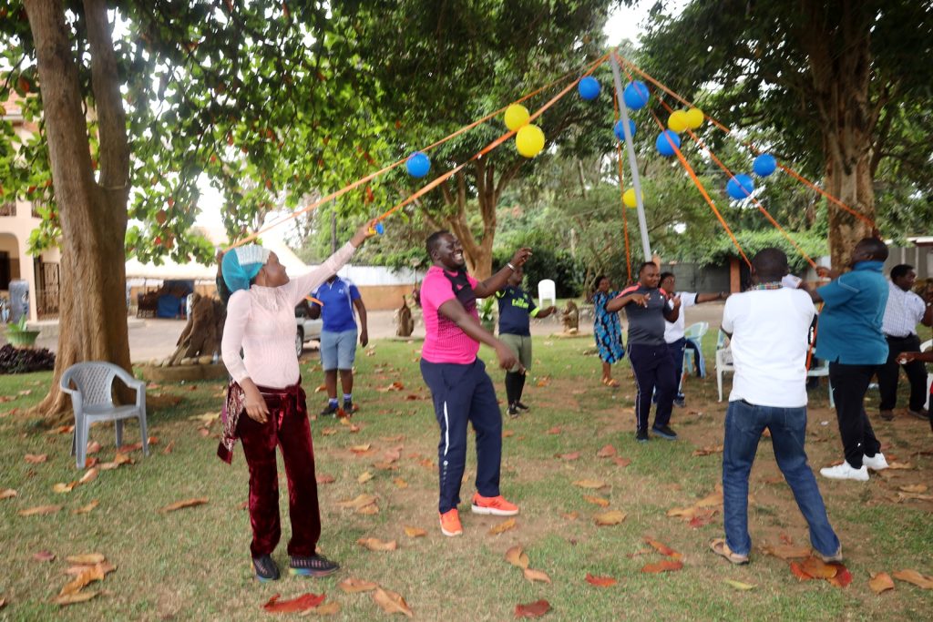 School staff take part in one of the team building activities.