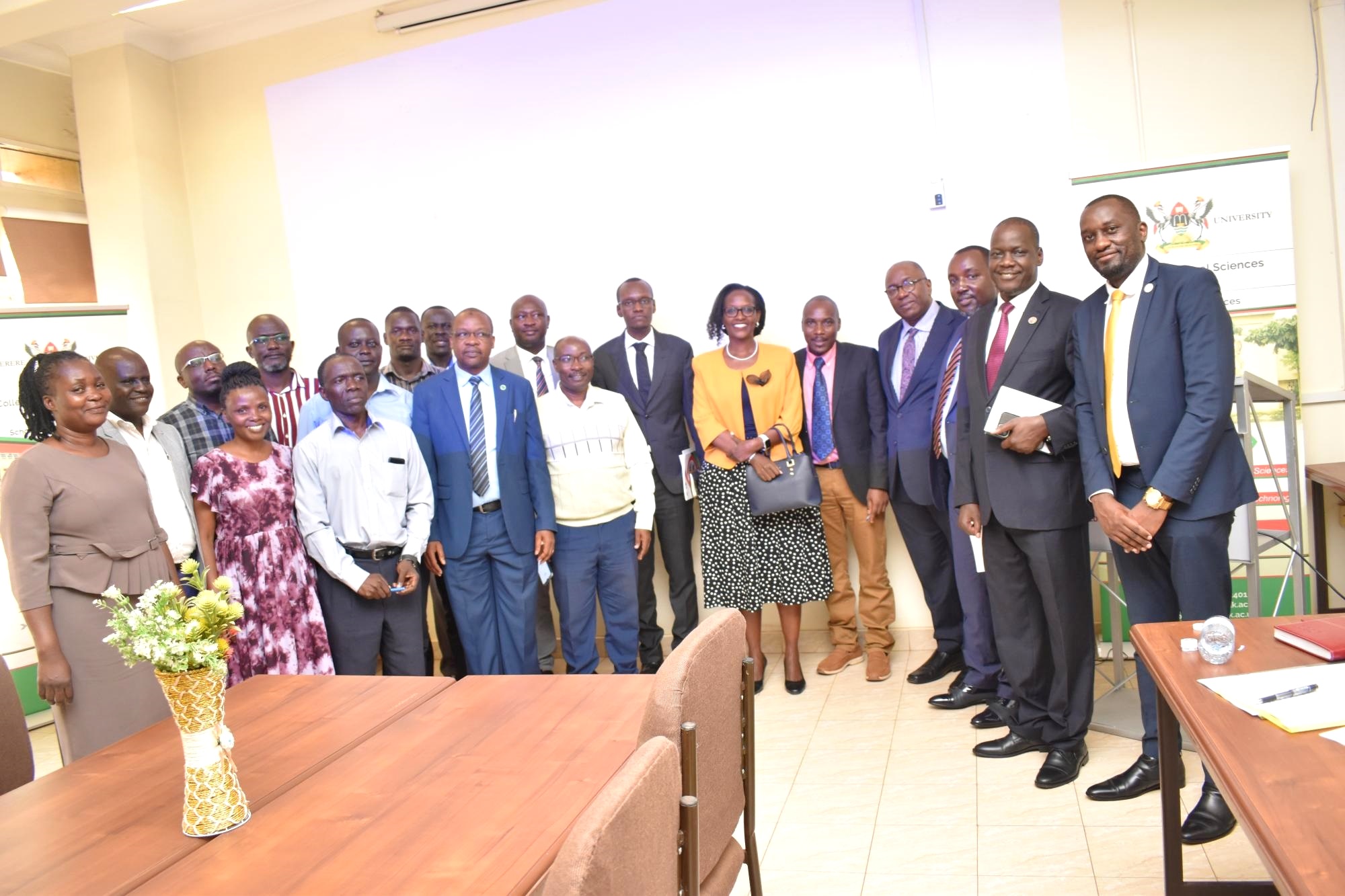 The Chairperson, Mrs. Lorna Magara (Centre) and Members of Council pose for a group photo with the Principal and Leadership of CoNAS after the meeting on 28th February 2023 in the Chemistry Boardroom, Makerere University.