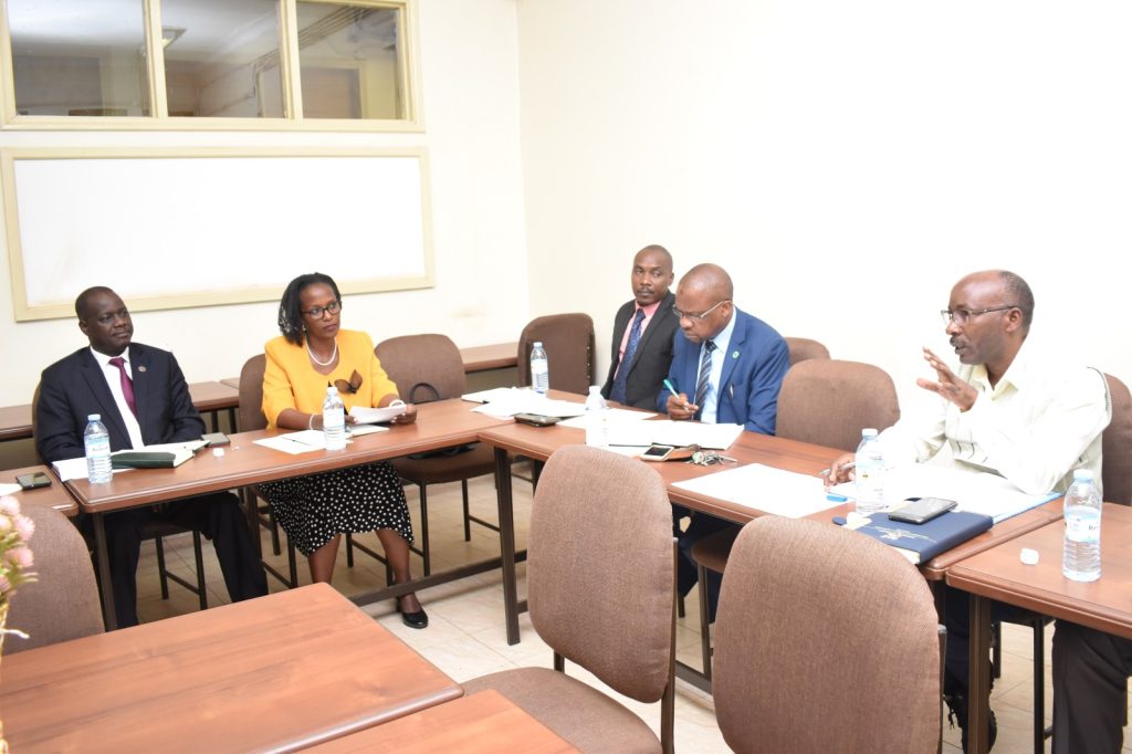 The Dean, School of Biosciences, CoNAS, Prof. Arthur Tugume (Right) makes his submission during the meeting.