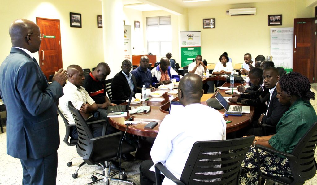 Prof. Bbaale speaking to participants during the training.