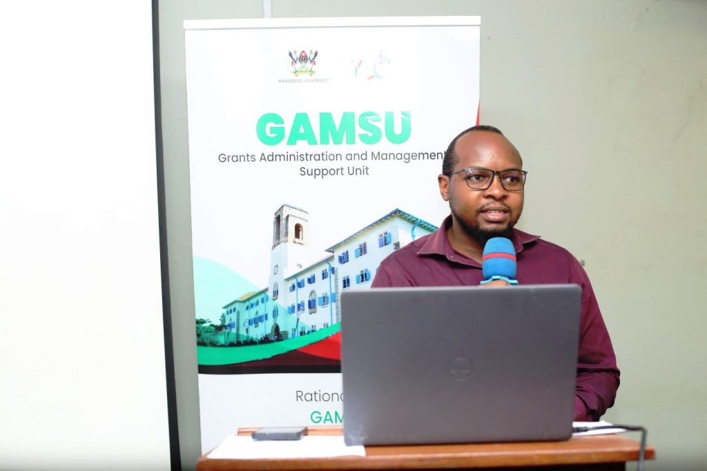 Laban Lwasa, the Senior Administrative Assistant at GAMSU, introducing funder platforms accessible to Makerere University staff.