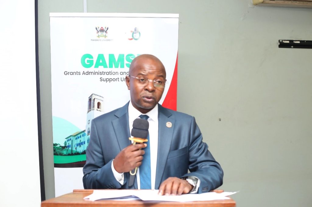 Prof. Edward Bbaale, Director of the Directorate of Research and Graduate Training (DRGT), addresses participants at the GAMSU workshop.