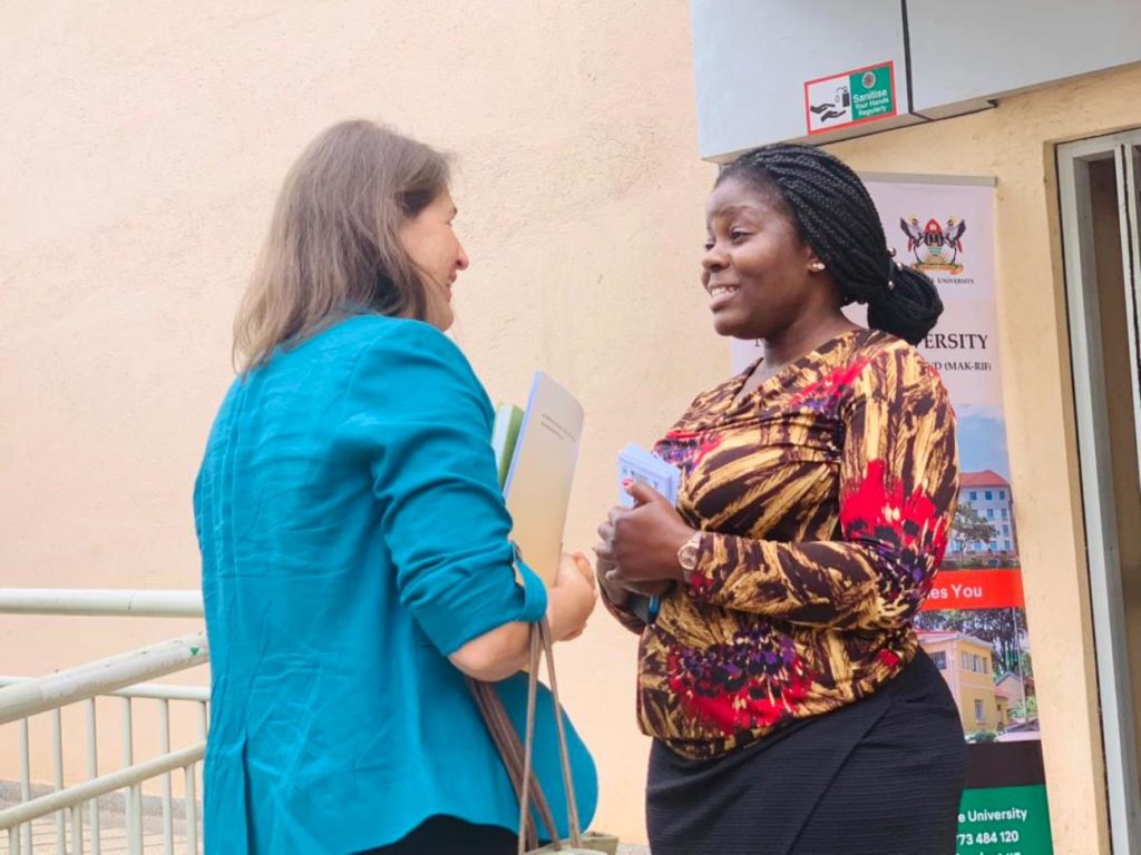 Amy Peterson, Cultural Affairs Officer the US Embassy Kampala who represented the Ambassador Natalie E. Brown shares with Ms. Stella Kakeeto from MakSPH. Ms. Kakeeto is a co-PI on the project.