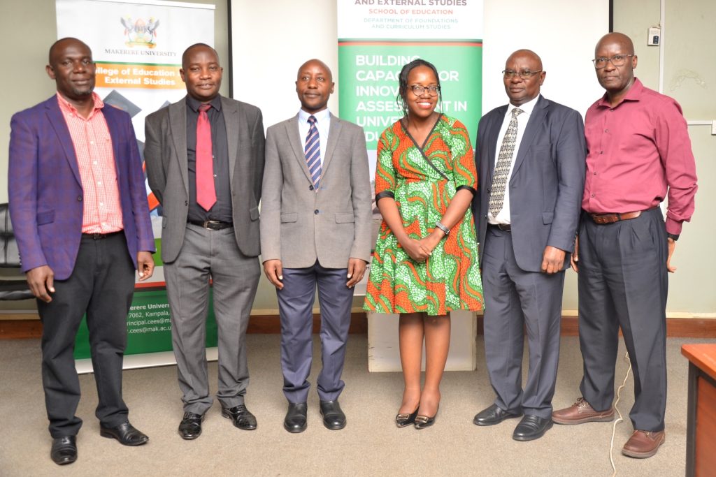 Members of the research team pose with participants at the training workshop.