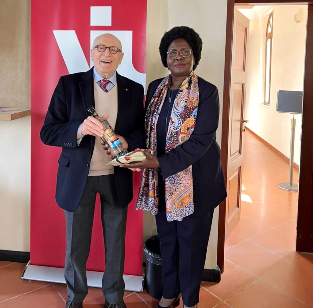 Ambassador Elizabeth Paula Napeyok (Right) presents an assortment of Ugandan products to VIU President Umberto Vattani (Left).
