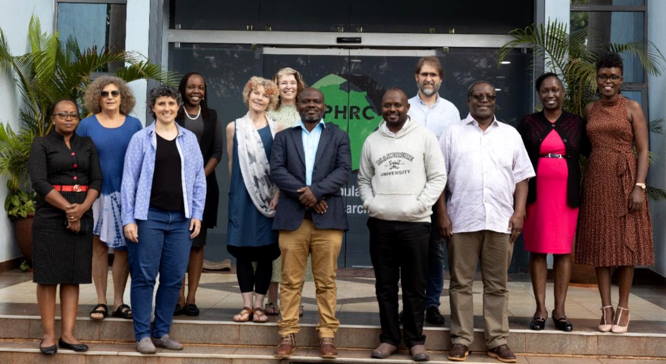 Dr. John Bosco Isunju, Lecturer, Makerere University School of Public Health (Front Row: 2nd Right) with the Board of Management (BoM) at the APHRC campus, Nairobi Kenya. Photo: CARTA
