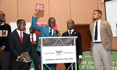 H.E. Robert Maseruka takes oath as the Chairperson of the Students’ Electoral Commission for the 89th Guild, Mr. Levi Tshilumba (Right) and his supporters witness. Yusuf Lule Central Teaching Facility Auditorium, Makerere University, Kampala Uganda, East Africa.