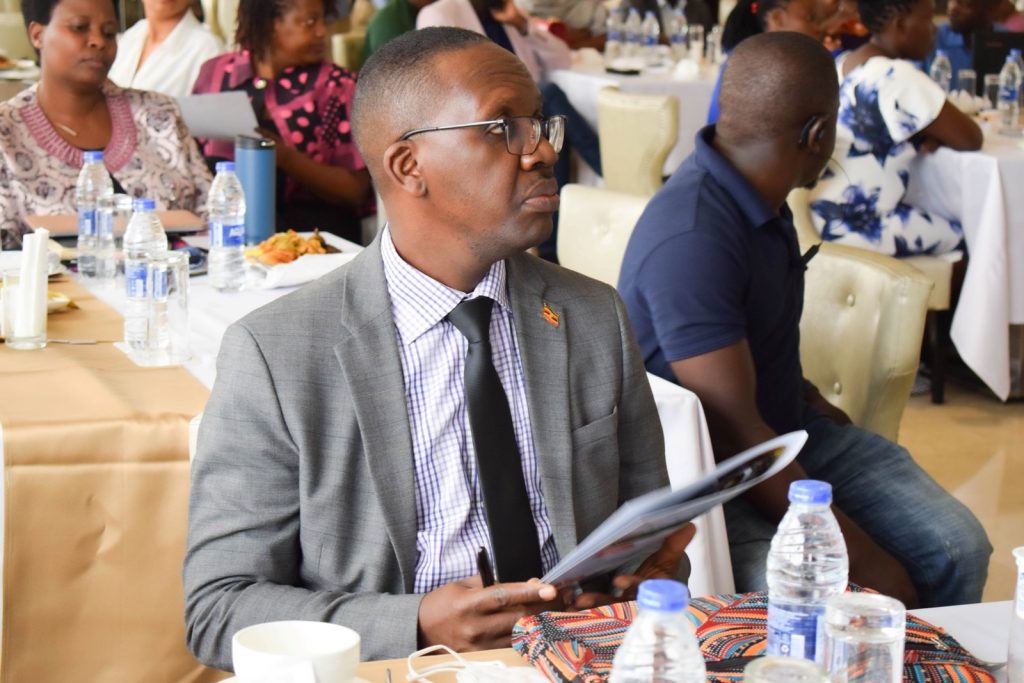 Dr. Daniel Kyabayinze, the Director of Public Health at the Ministry of Health -Uganda during the dissemination meeting at Golden Tulip Hotel in  Kampala.