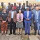 Front Row: The Vice Chancellor-Prof. Barnabas Nawangwe (2nd R) and Principal CoBAMS-Prof. Eria Hisali (R) with the PI-Prof. Boksun Kim (3rd R), Co-PI-Dr. Cathy Ikiror Mbidde (L), Co-PI-Dr. Geremew Teklu (3rd L), Ms. Pippa Waller (4th L), officials and mentees at the launch of a mentorship program for female students in Science, Technology, Engineering and Mathematics (STEM) on 6th April 2023 at CoBAMS, Makerere University.