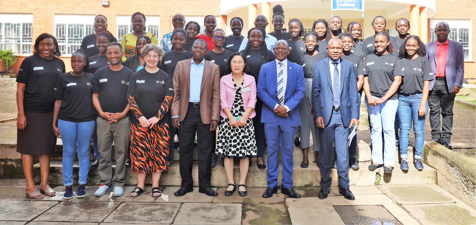 Front Row: The Vice Chancellor-Prof. Barnabas Nawangwe (2nd R) and Principal CoBAMS-Prof. Eria Hisali (R) with the PI-Prof. Boksun Kim (3rd R), Co-PI-Dr. Cathy Ikiror Mbidde (L), Co-PI-Dr. Geremew Teklu (3rd L), Ms. Pippa Waller (4th L), officials and mentees at the launch of a mentorship program for female students in Science, Technology, Engineering and Mathematics (STEM) on 6th April 2023 at CoBAMS, Makerere University.