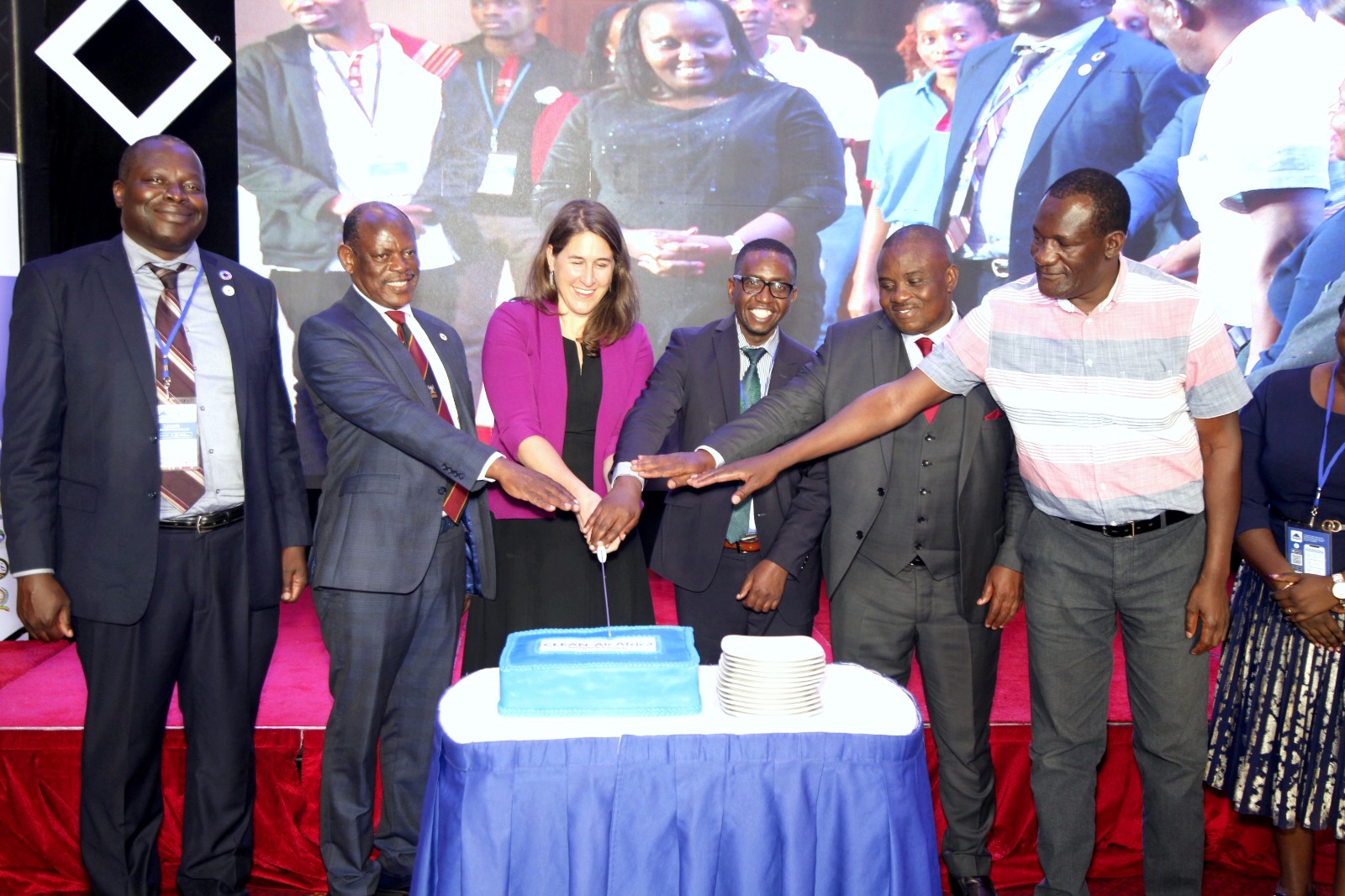 Left to Right: Prof. Tonny Oyana, Prof. Barnabas Nawangwe, Ms. Amy Petersen, Prof. Engineer Bainomugisha, His Worship Erias Lukwago and Mr. Abala M. Wanga cut cake to mark the launch of the CLEAN-Air Africa Network on 5th April 2023 at the Kampala Sheraton Hotel. Photo: Landmark Media Consults