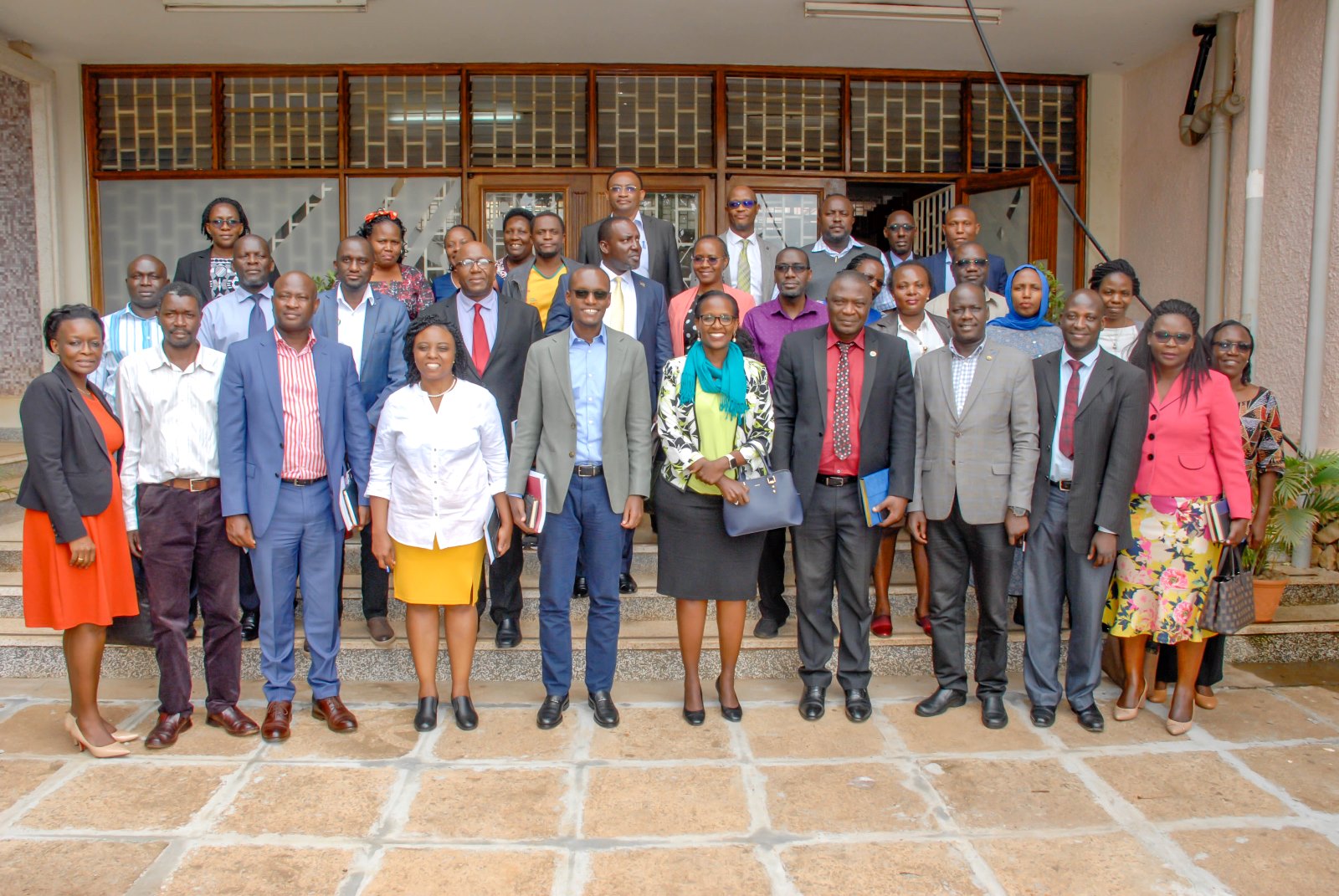 Front Row: The Chairperson Council-Mrs. Lorna Magara (5th R), Deputy Chairperson Council-Rt. Hon. Daniel Fred Kidega (3rd R), Principal MakCHS-Prof. Damalie Nakanjako (4th L), Deputy Principal MakCHS-Assoc. Prof. Isaac Kajja (4th R) with Members of Council and CHS Leadership after the meeting on 3rd March 2023, Sir Albert Cook Memorial Library, MakCHS, Makerere University, Mulago Hill.