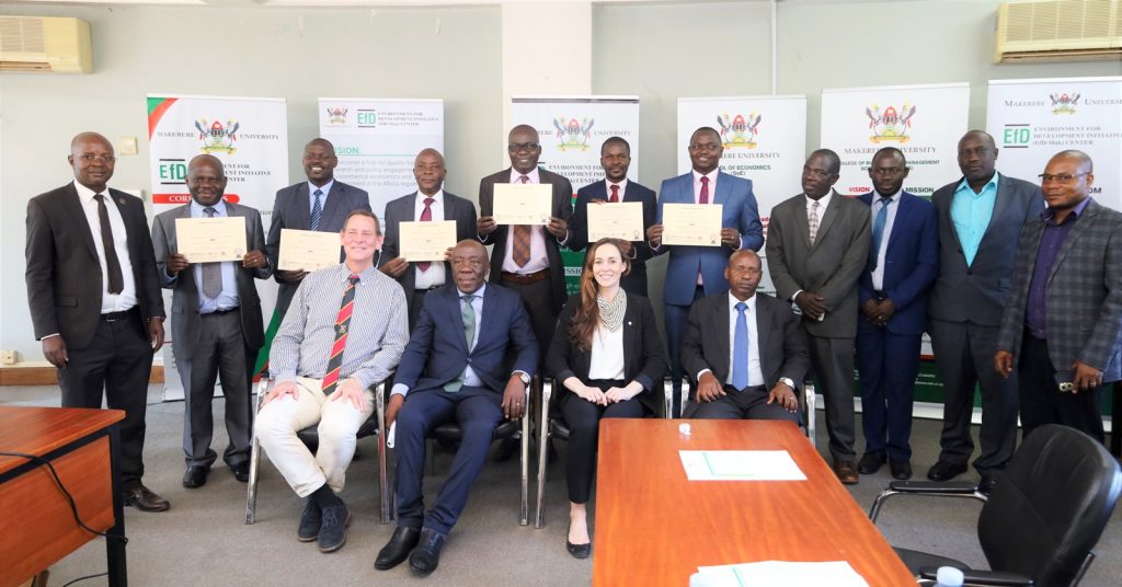 Participants, Program Leaders and University officials pose for a group photo after the certificate award ceremony.