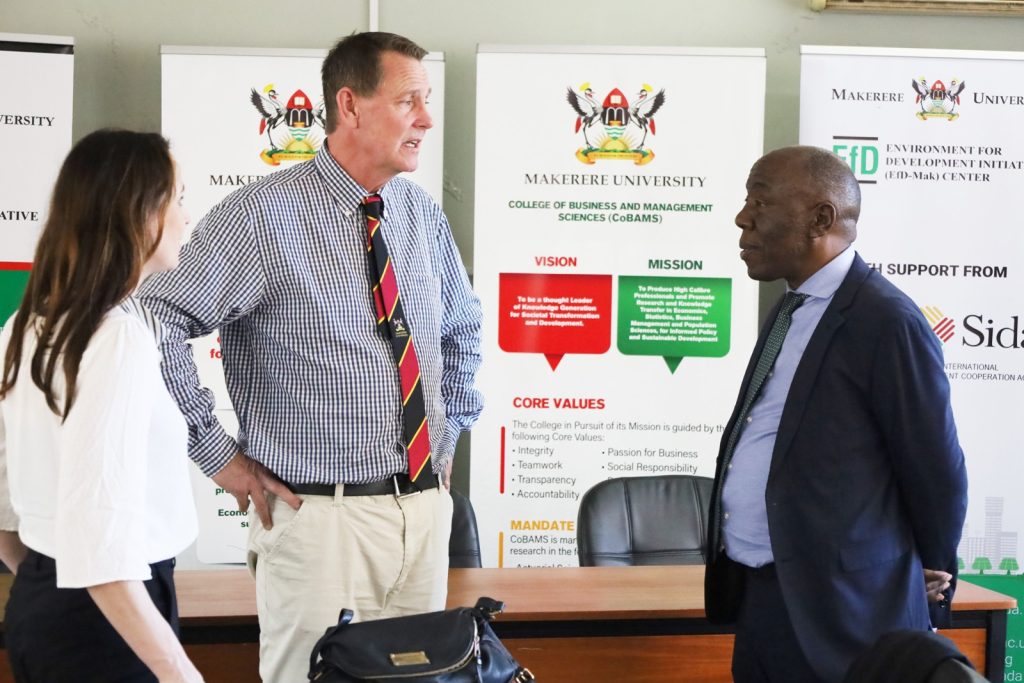 IGE Global Hub Leaders interact with Eng. Prof. Henry Alinaitwe (Right) during one of the breaks.