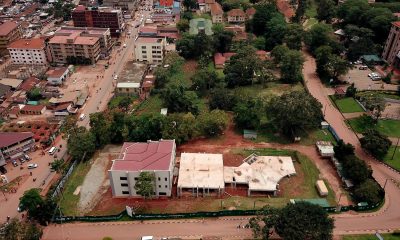 An aerial view of the Makerere University School of Public Health construction site on the Main Campus. To the Right is the Infectious Diseases Institute (IDI) and in the background are Dag Hammaskjold Hall (Green roof) and University Hall (Brown tiles).
