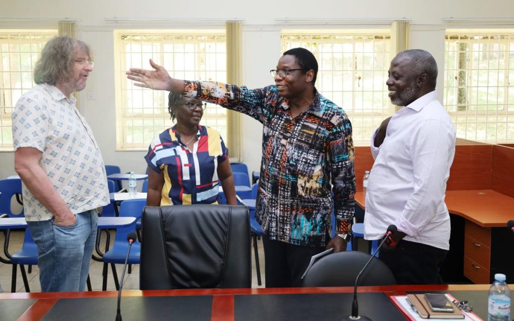 The evaluation team interacts with Dr. Edgar Nabutanyi (R) and Dr. Okot Benge (2nd R) after the meeting. CHUSS, Makerere University, Kampala Uganda.